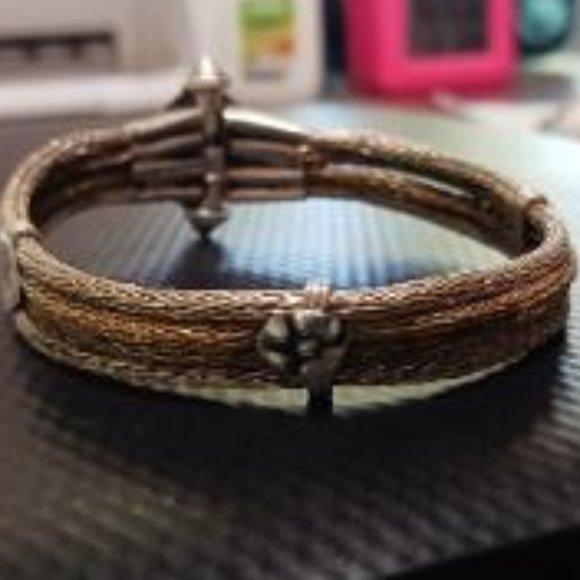 Antique Bracelet, gold and silver braided wire with gold emblem and screw dowels